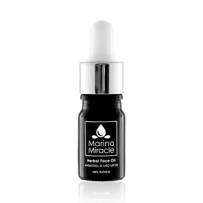 Herbal face oil ansiktsolje. 5 ml liten glassflaske med dropper.